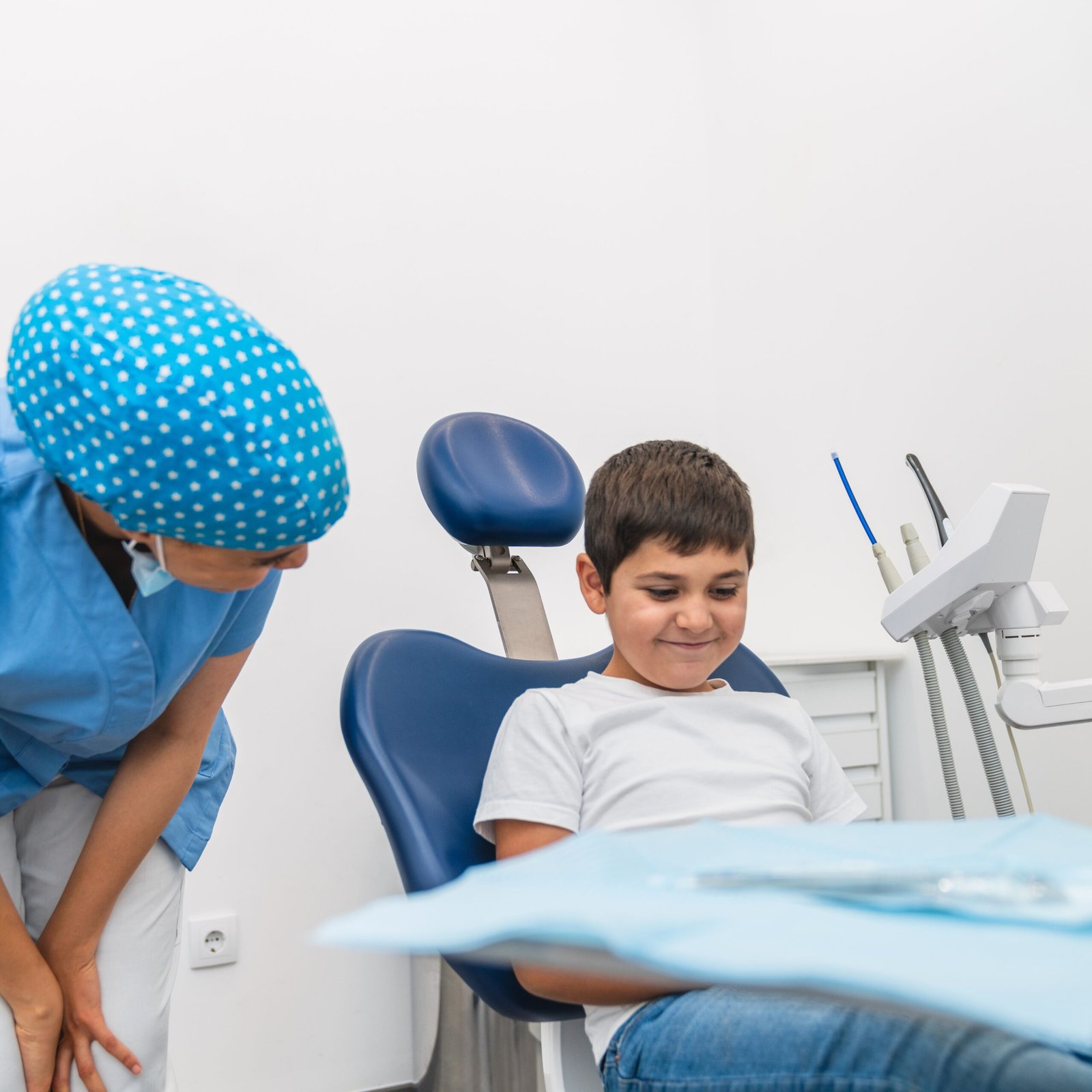 child sitting in the dental chair while the hygien 2025 03 09 06 04 08 utc 1 1 scaled